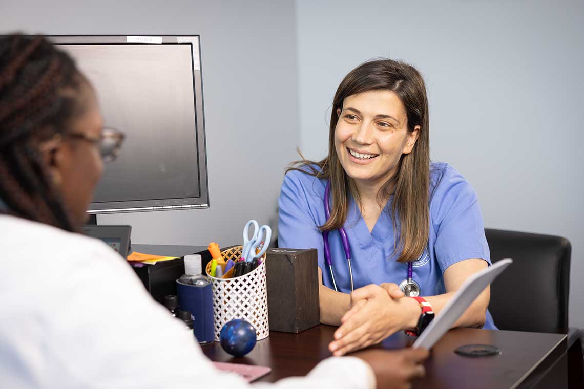 nursing student talking to counselor