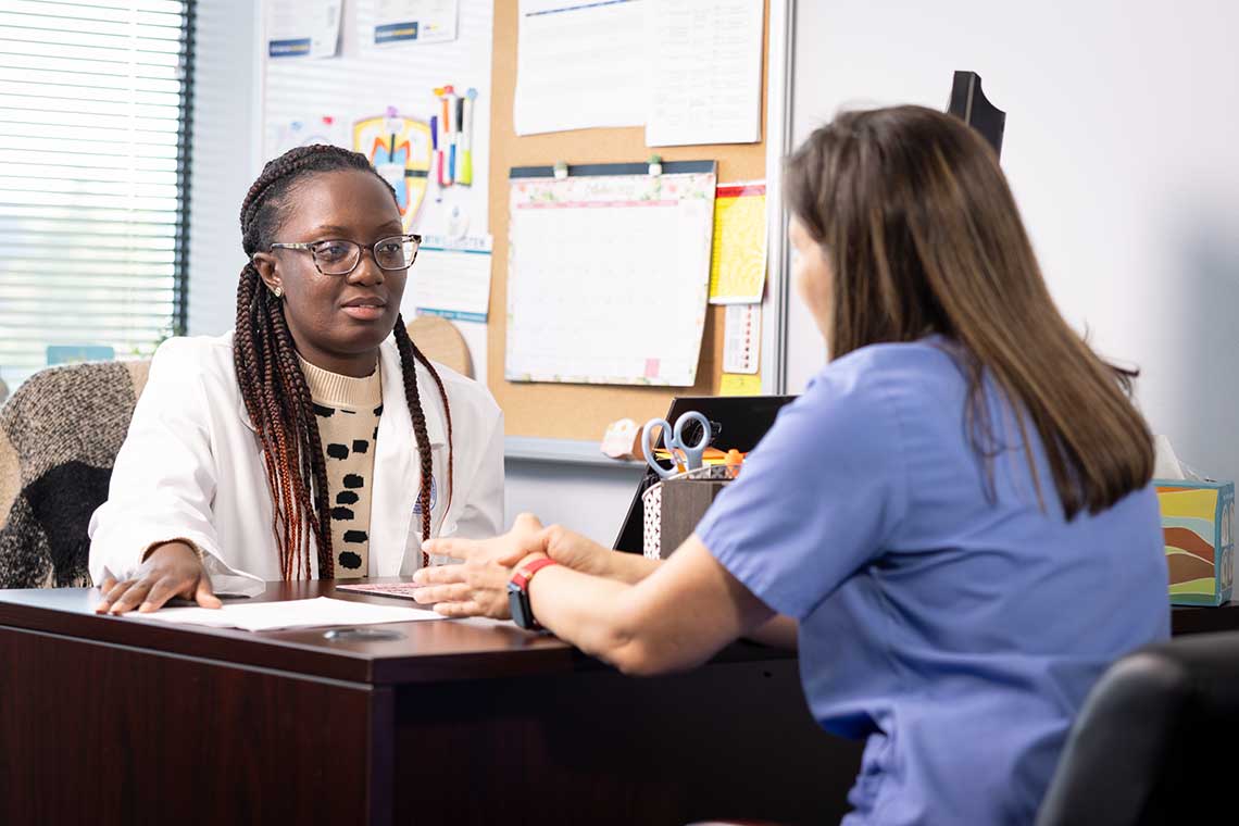 counselor speaking with ABSN student